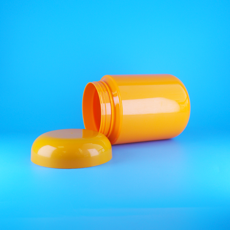 Yuvarlak Şekilli Gıda Sınıfı Turuncu Plastik PET Vidalı Düz Turuncu Kapaklı Kurabiye Şeker Kavanozları